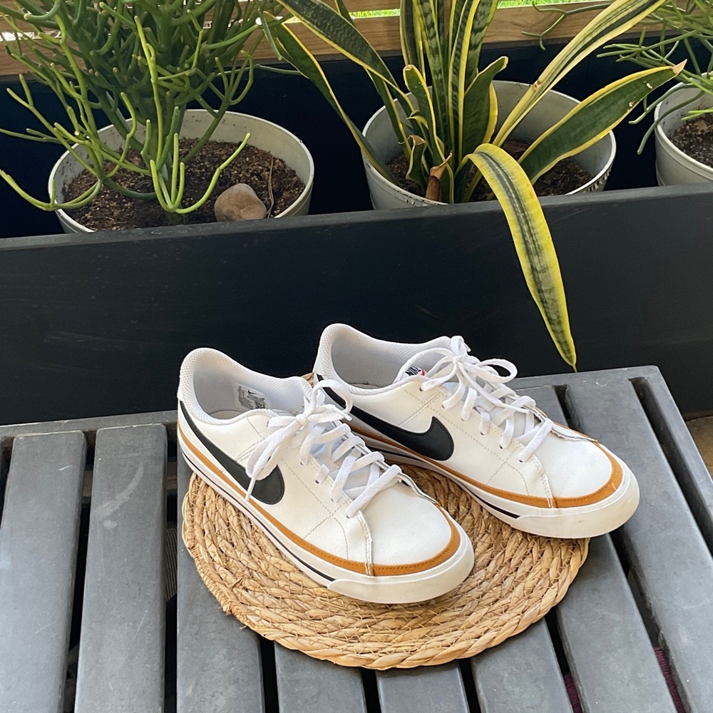 Nike White Sneakers with Black Swoosh and Tan Trim